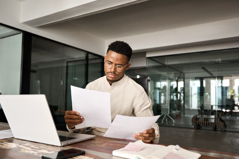 Home 4 Underwriter reviewing loan docs